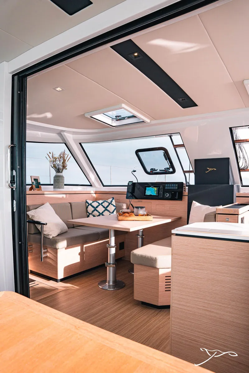 Slide: The Image of 2025 Nautitech 40 Open yacht interior with modern seating and navigation area. - 29