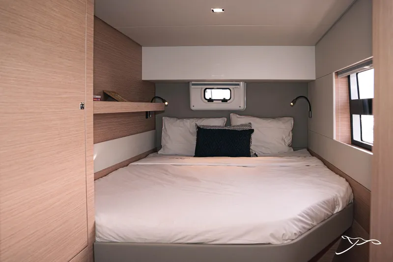 Slide: The Image of Luxurious cabin interior of 2025 Nautitech 40 Open catamaran with cozy bedding. - 42