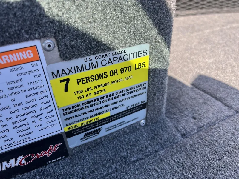 Slide: The Image of 2019 Alumacraft Trophy 175 capacity label: 7 persons or 970 lbs, 150 HP motor. - 15