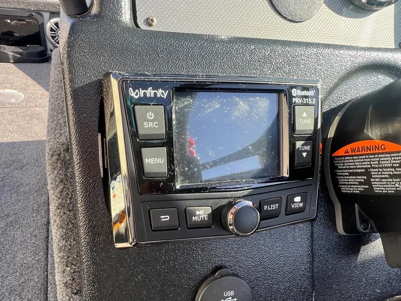 Slide: The Image of 2019 Alumacraft Trophy 175 dashboard with Infinity Bluetooth stereo system. - 21