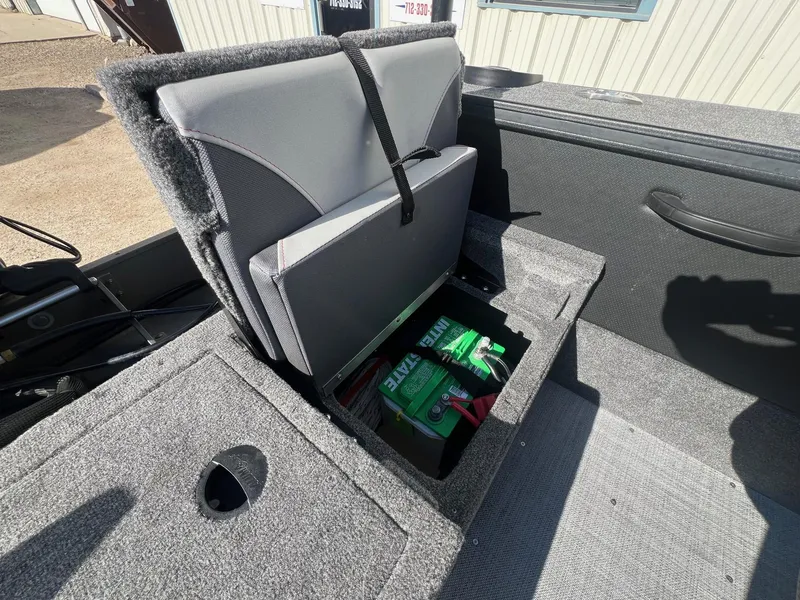 Slide: The Image of 2019 Alumacraft Trophy 175 boat seat with storage compartment and battery inside. - 31