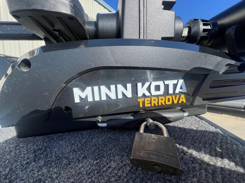 Slide: The Image of Minn Kota Terrova motor on 2019 Alumacraft Trophy 175 boat, secured with a padlock. - 8