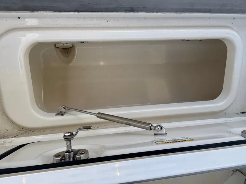 Slide: The Image of Open storage compartment on a 2020 Boston Whaler 280 Vantage boat. - 9