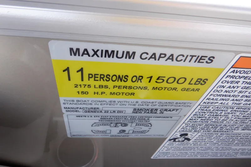 Slide: The Image of Control panel of 2024 SunChaser Geneva Cruise 22 LR DH boat with switches and steering wheel. - 23