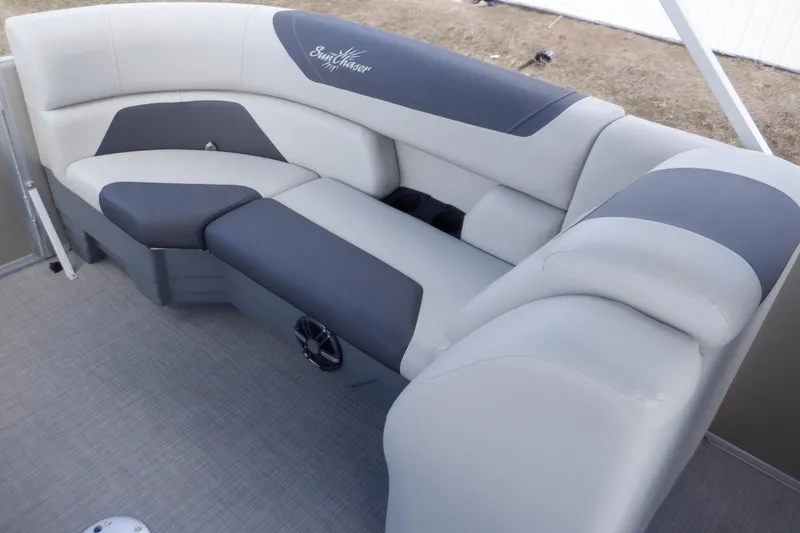 Slide: The Image of 2024 SunChaser Geneva Cruise 22 LR DH boat interior with plush seating. - 25