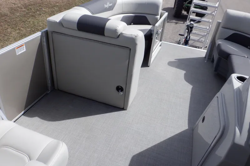 Slide: The Image of 2024 SunChaser Geneva Cruise 22 LR DH boat dashboard with steering wheel and controls. - 27