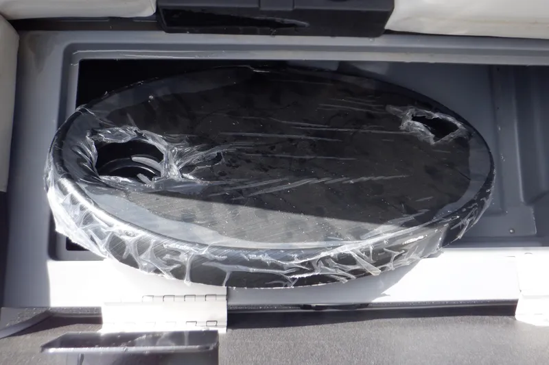 Slide: The Image of 2024 SunChaser Geneva Cruise 22 LR DH boat interior with plush seating and modern design. - 30