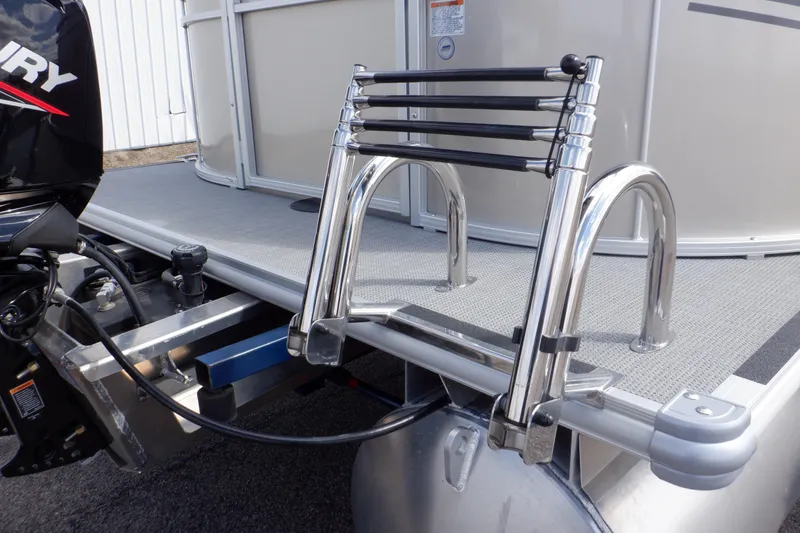 Slide: The Image of 2024 SunChaser Geneva Cruise 22 LR DH pontoon boat with Mercury 90 engine, rear view. - 32