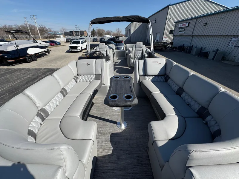 Slide: The Image of 2019 Bennington R 25 RSR pontoon boat with spacious seating and modern design. - 13