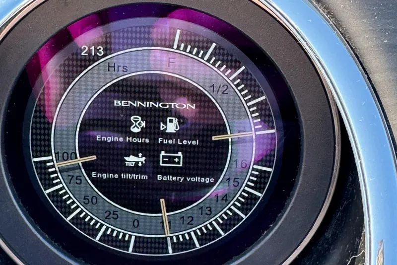 Slide: The Image of Dashboard gauge of 2019 Bennington R 25 RSR showing engine hours and fuel level. - 21