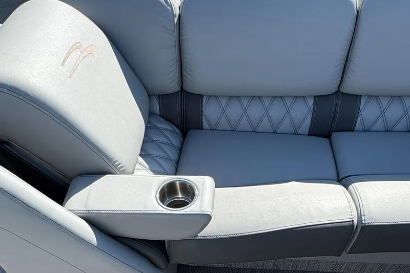 Slide: The Image of Luxurious seating on 2019 Bennington R 25 RSR boat with cup holder and elegant stitching. - 26