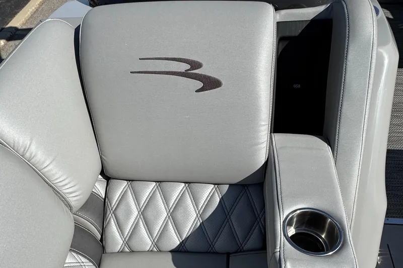 Slide: The Image of Gray leather seat with diamond stitching and cup holder, Bennington R 25 RSR 2019. - 27