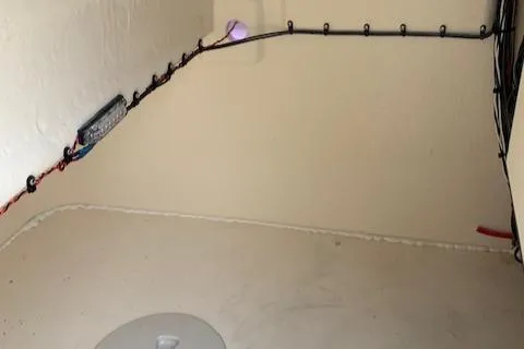 Slide: The Image of Interior view of 2025 Jones Brothers 23 Cape Fisherman boat wiring setup. - 15