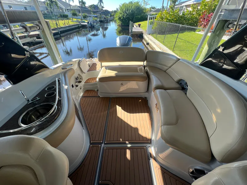 Slide: The Image of Luxurious 2018 Crownline E26 XS boat interior with plush seating and sleek design. - 14