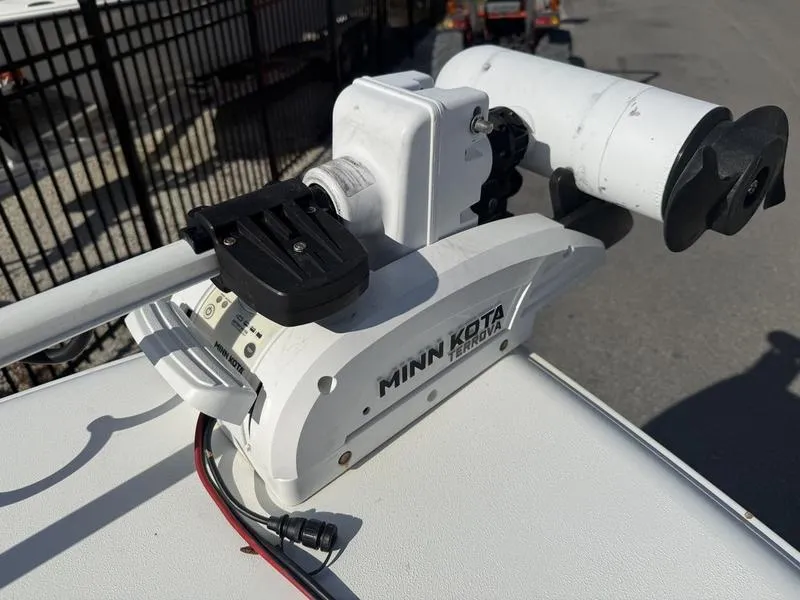 Slide: The Image of Minn Kota trolling motor on 2019 Sea Hunt Ultra 211 boat deck. - 11