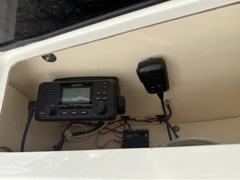 Slide: The Image of Garmin marine radio setup in 2019 Sea Hunt Ultra 211 boat console. - 7