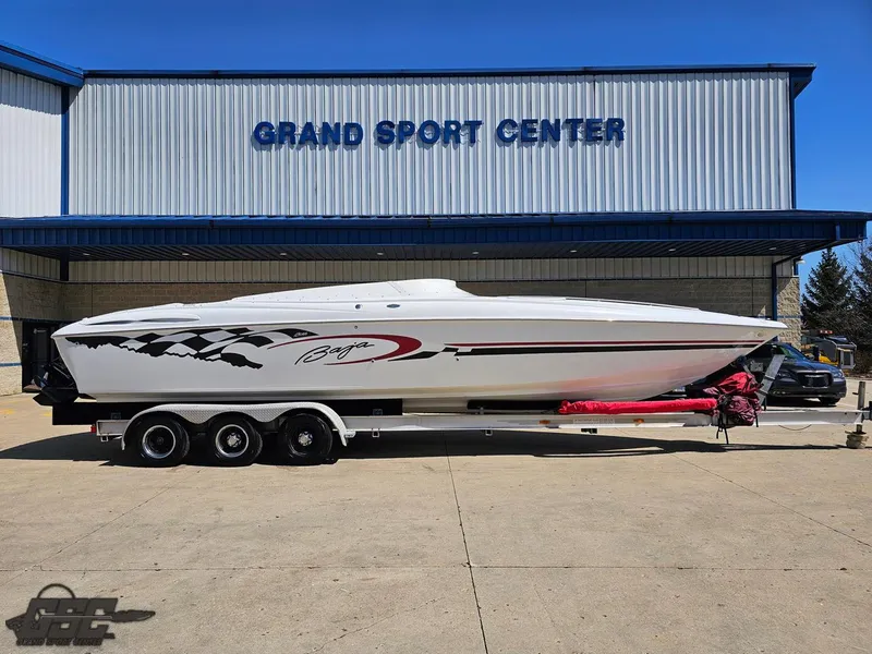 Slide: The Image of 2002 Baja 342 speedboat on trailer at Grand Sport Center. - 1