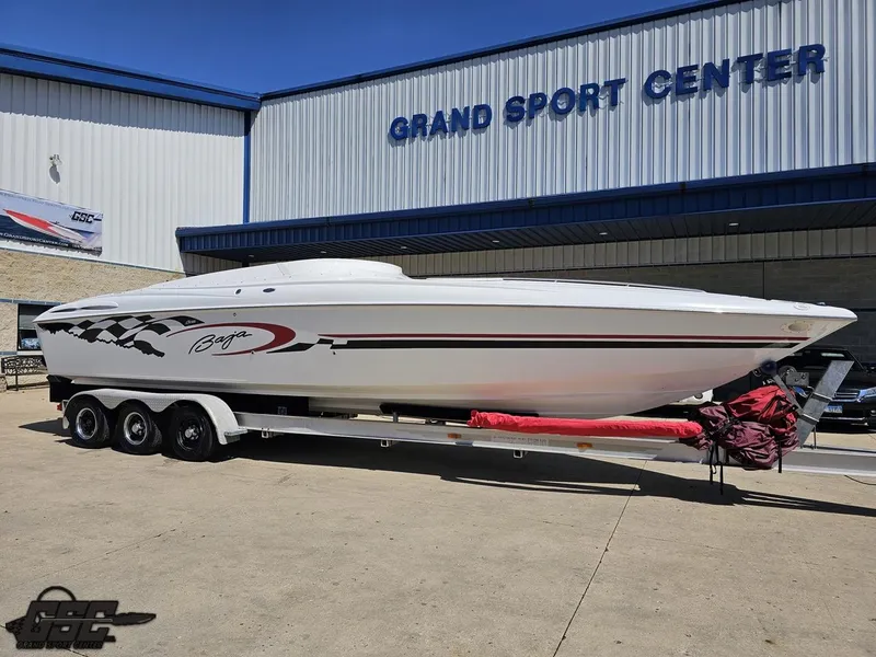 Slide: The Image of 2002 Baja 342 boat on trailer at Grand Sport Center. - 10