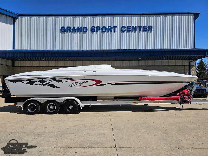 Slide: The Image of 2002 Baja 342 boat on trailer at Grand Sport Center. - 2