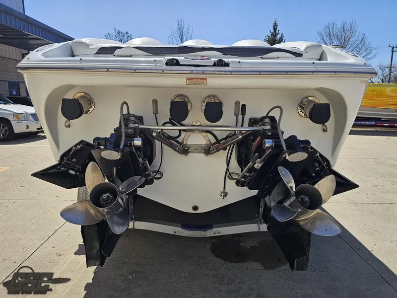 Slide: The Image of Rear view of a 2002 Baja 342 boat with dual propellers. - 28