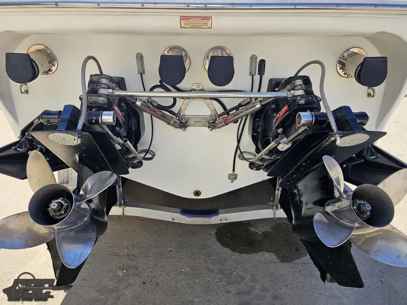 Slide: The Image of 2002 Baja 342 boat with dual propellers and outboard motors. - 29