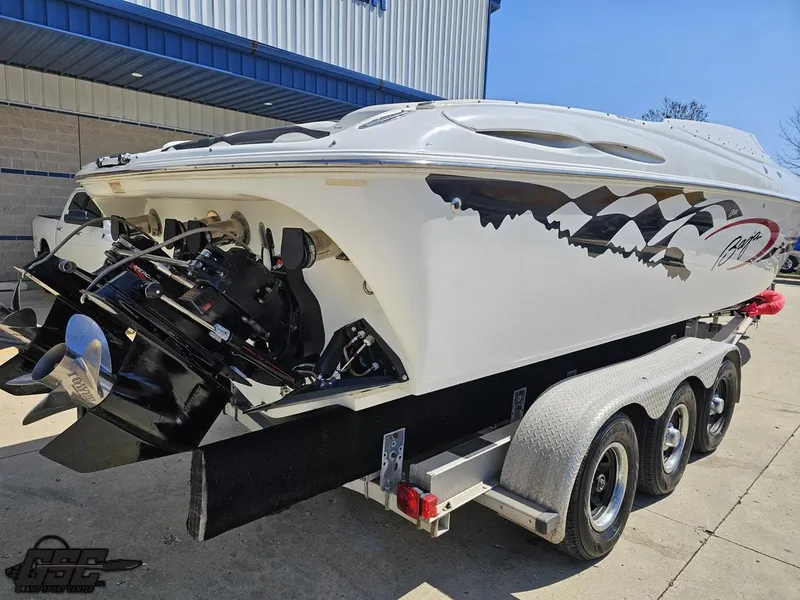Slide: The Image of 2002 Baja 342 speedboat on a trailer, featuring a sleek design and powerful engine. - 30