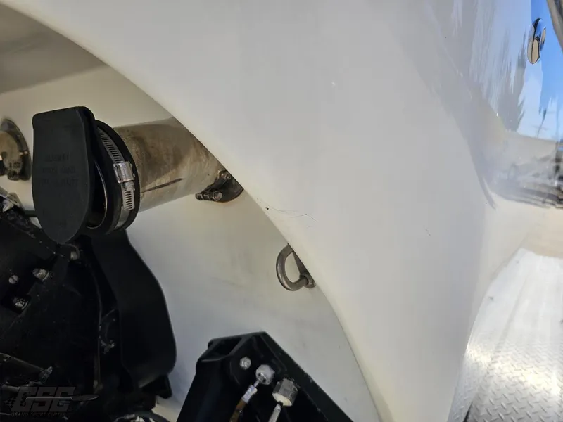 Slide: The Image of Close-up of a 2002 Baja 342 boat's exhaust and hardware components. - 32
