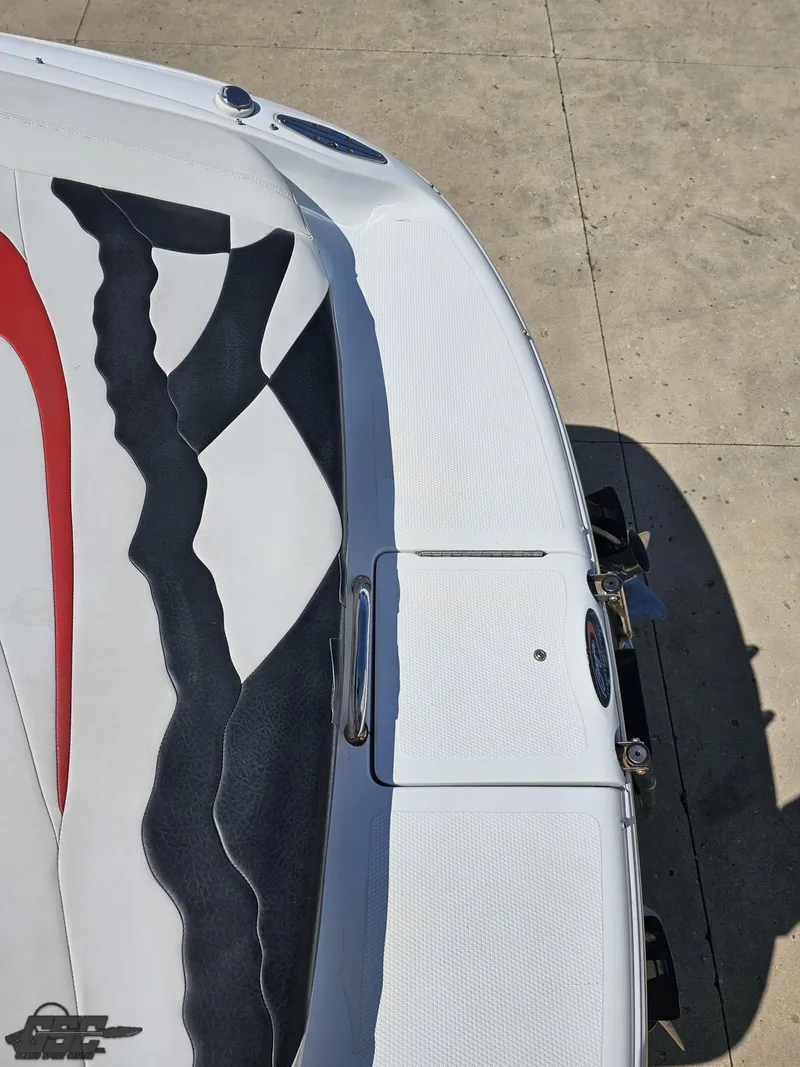 Slide: The Image of 2002 Baja 342 boat with sleek design and vibrant upholstery details. - 34
