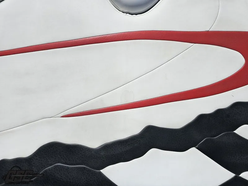 Slide: The Image of Abstract design on 2002 Baja 342 boat upholstery with red, white, and black patterns. - 40