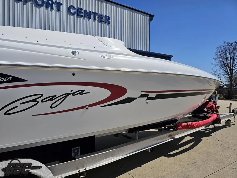 Slide: The Image of 2002 Baja 342 boat on trailer at a marine center. - 5