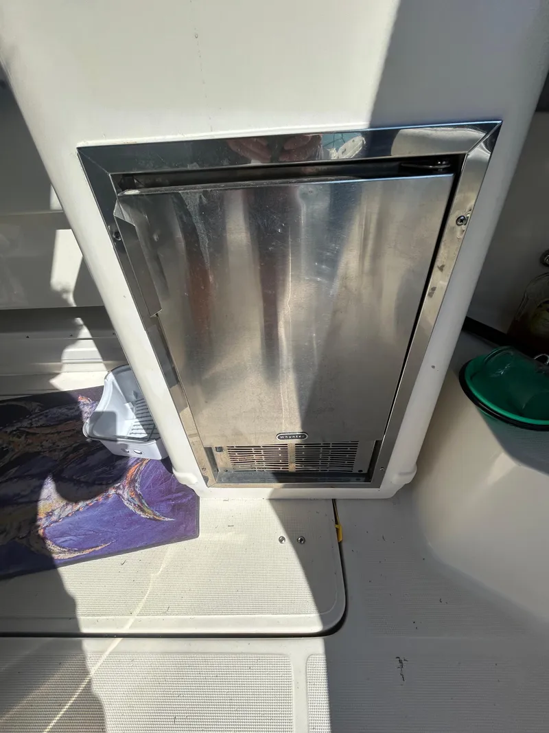 Slide: The Image of Stainless steel appliance on 1998 Tiara Yachts 3500 Express boat deck. - 43