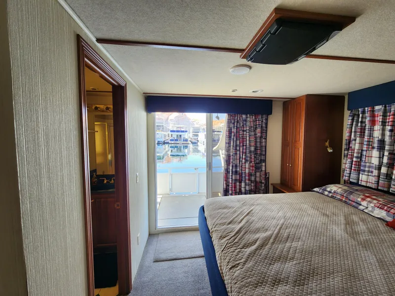 Slide: The Image of Cozy bedroom in 2004 Skipperliner Inn Conspicuous Share with marina view. - 17