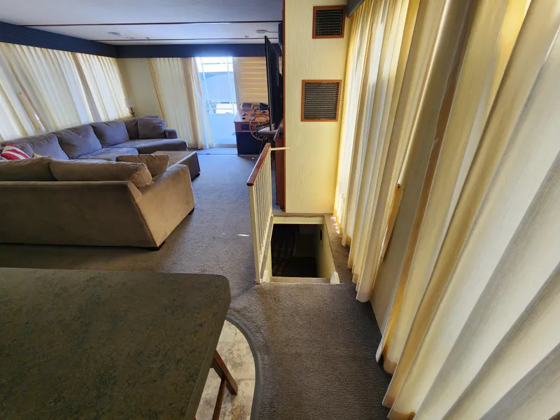 Slide: The Image of Luxurious 2004 Skipperliner interior with cozy seating and elegant decor. - 5