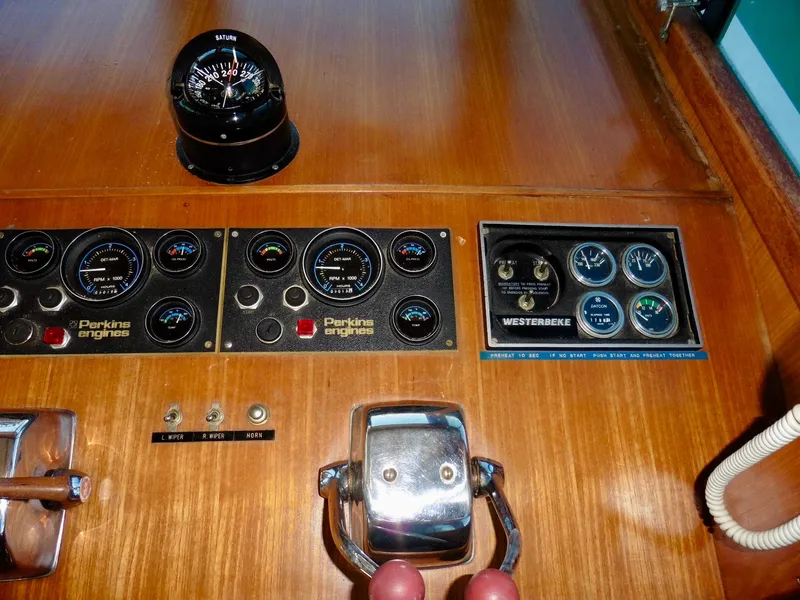 Slide: The Image of Control panel of 1984 Ponderosa 42 boat with Perkins engines and Westebeke gauges. - 30