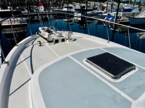 Slide: The Image of Bow view of 1984 Ponderosa 42 yacht docked at marina. - 4