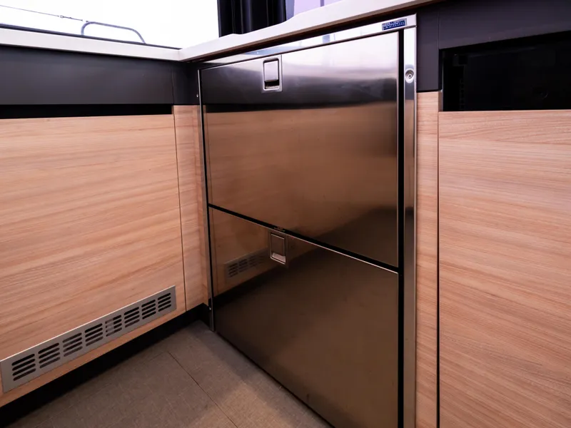 Slide: The Image of Modern kitchen interior of 2026 Windelo 50 Adventure yacht with stainless steel appliances. - 18