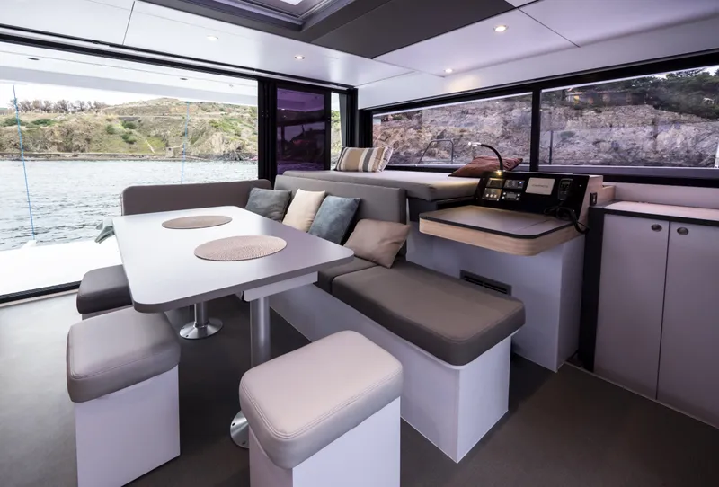 Slide: The Image of Modern interior of 2026 Windelo 50 Adventure yacht with sleek dining area and panoramic windows. - 21