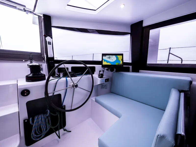 Slide: The Image of 2026 Windelo 50 Adventure yacht cockpit with modern navigation system and comfortable seating. - 32