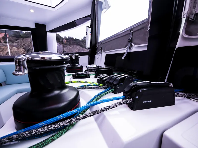 Slide: The Image of 2026 Windelo 50 Adventure yacht interior with winches and colorful ropes. - 30