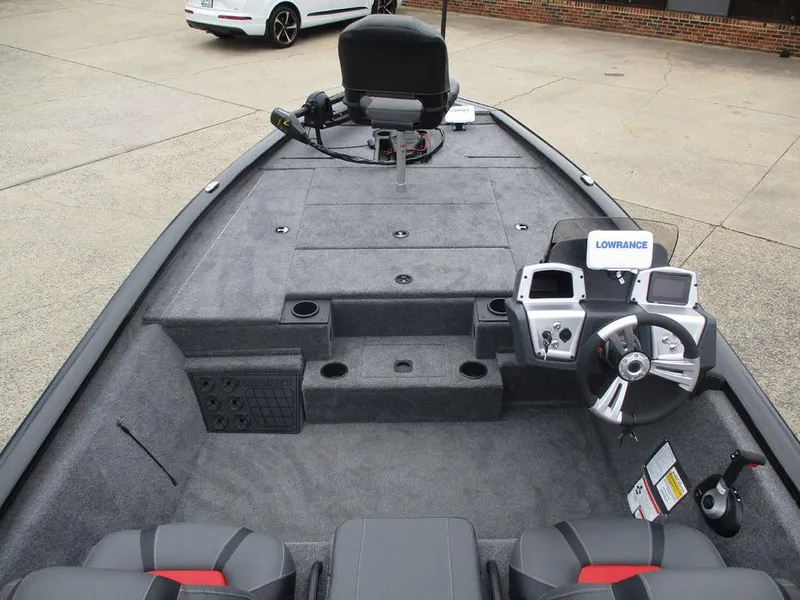 Slide: The Image of 2025 Tracker Pro Team™ 195 Tournament Edition boat interior with steering console and seating. - 5