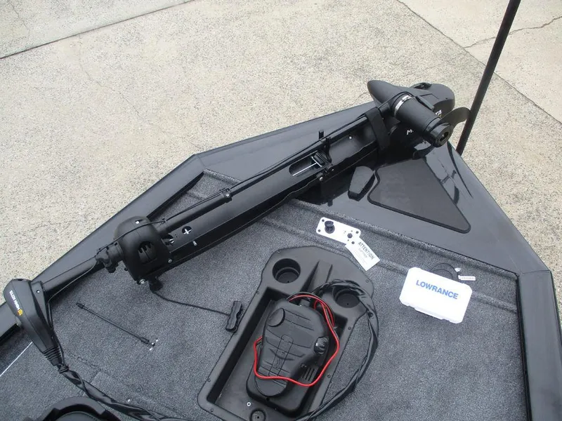 Slide: The Image of 2025 Tracker Pro Team™ 195 Tournament Edition boat deck with trolling motor and Lowrance equipment. - 7