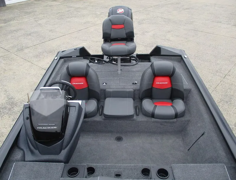 Slide: The Image of 2025 Tracker Pro Team™ 195 Tournament Edition boat interior with seating and steering console. - 8