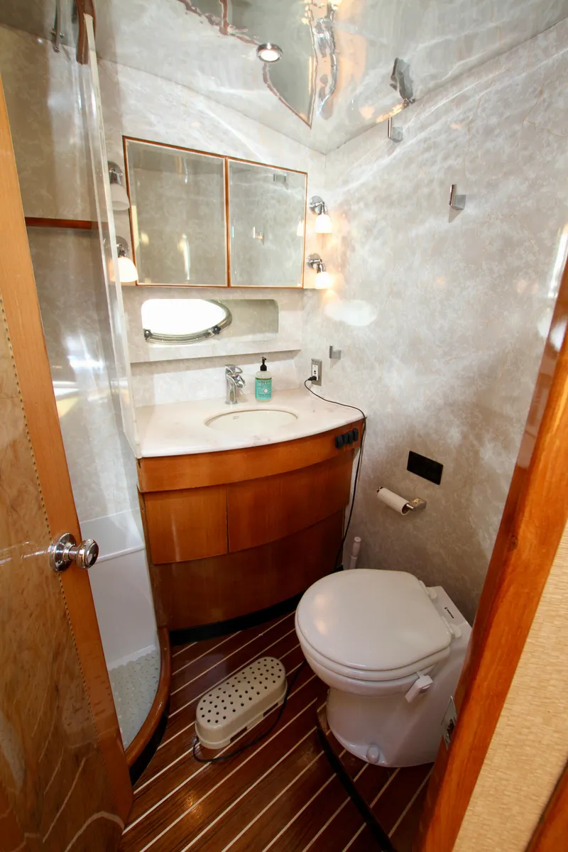 Slide: The Image of Luxurious yacht bathroom with modern fixtures, wooden flooring, and elegant design, Prima 5230, 1999. - 29