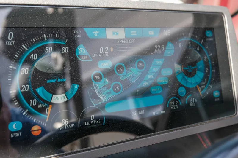 Slide: The Image of Dashboard display of a 2017 Malibu Wakesetter 22 MXZ boat, showing speed and engine metrics. - 18