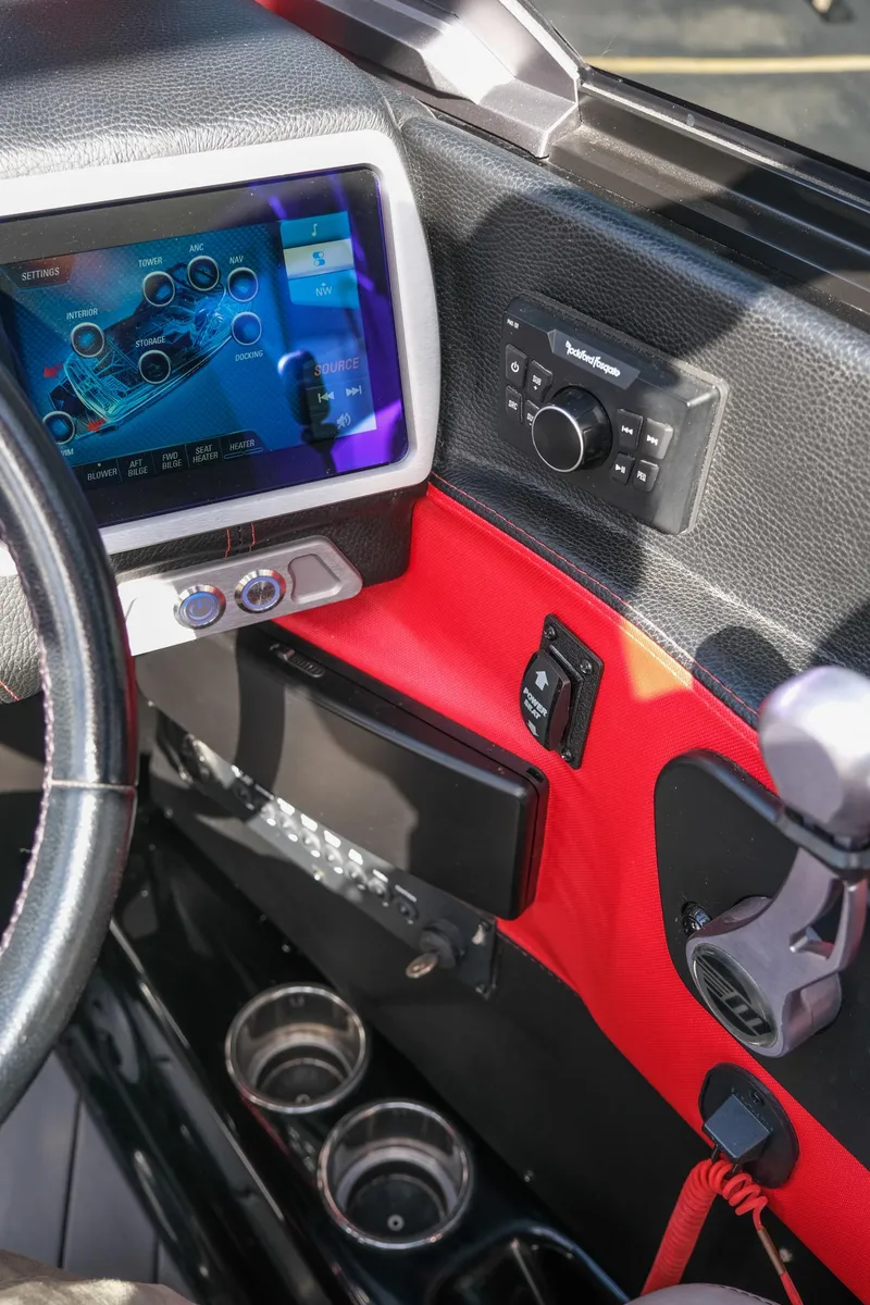 Slide: The Image of Dashboard of 2017 Malibu Wakesetter 22 MXZ with touchscreen and controls. - 21