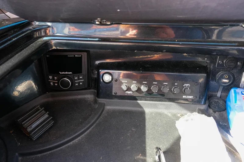 Slide: The Image of Control panel of 2017 Malibu Wakesetter 22 MXZ with audio system and controls. - 22