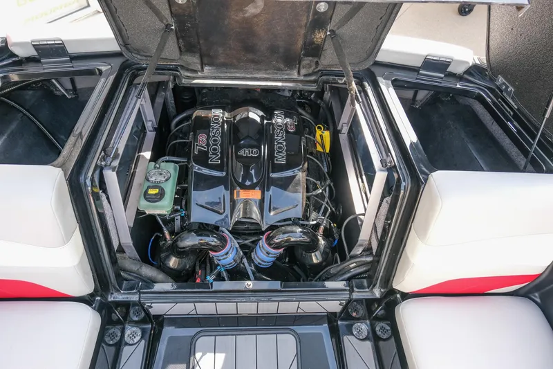 Slide: The Image of 2017 Malibu Wakesetter 22 MXZ engine compartment, showcasing powerful inboard motor. - 24