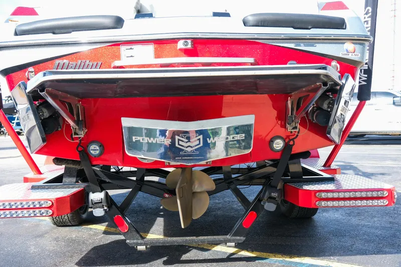 Slide: The Image of 2017 Malibu Wakesetter 22 MXZ boat rear view with Power Wedge feature. - 6