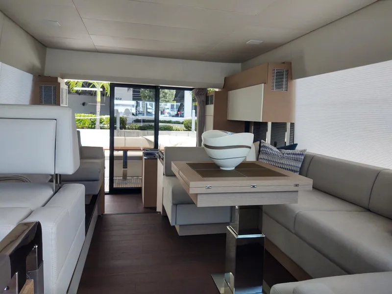 Slide: The Image of Luxurious interior of a 2020 Prestige 520S yacht with modern furnishings and elegant decor. - 22