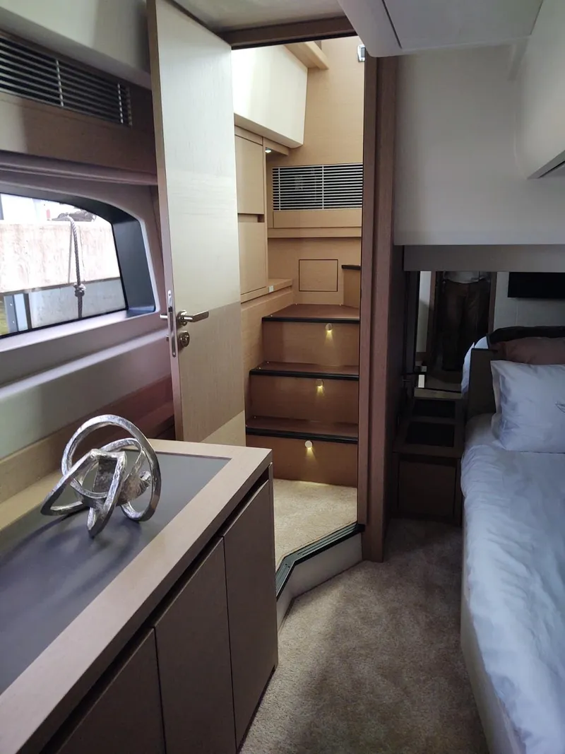 Slide: The Image of Luxurious interior of a 2020 Prestige 520S yacht, featuring elegant design and modern amenities. - 31